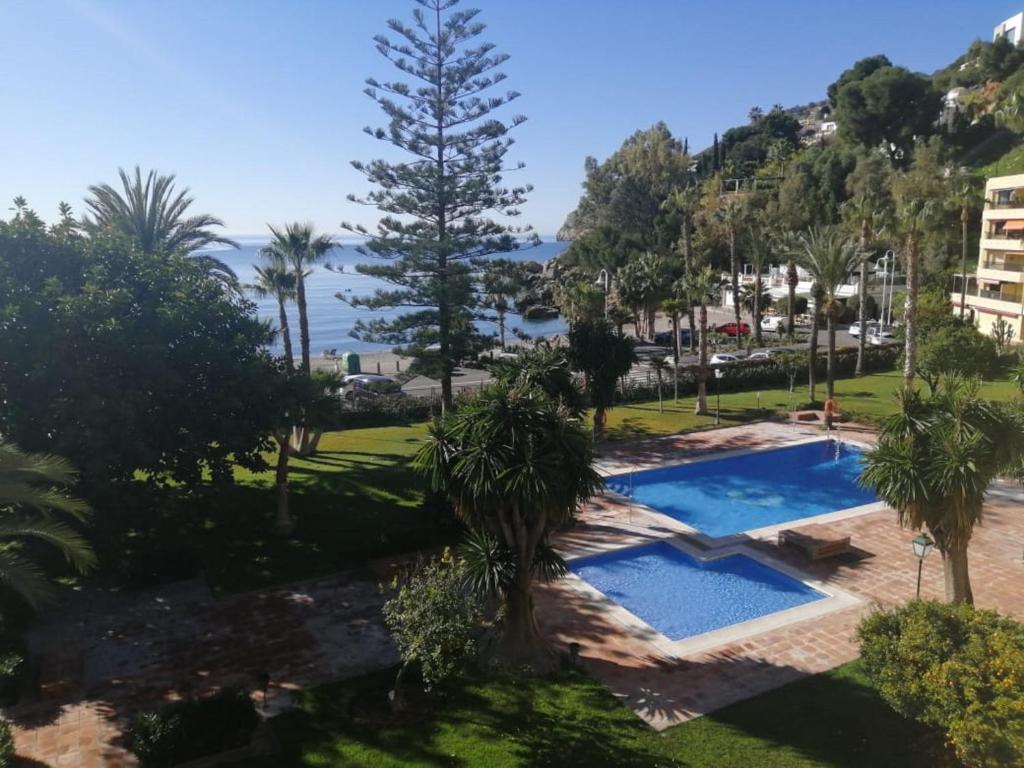 a view of the pool from the apartment at Rosa Nautica 301 in La Herradura