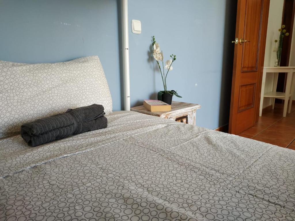 Postel nebo postele na pokoji v ubytování Aloha Surf House