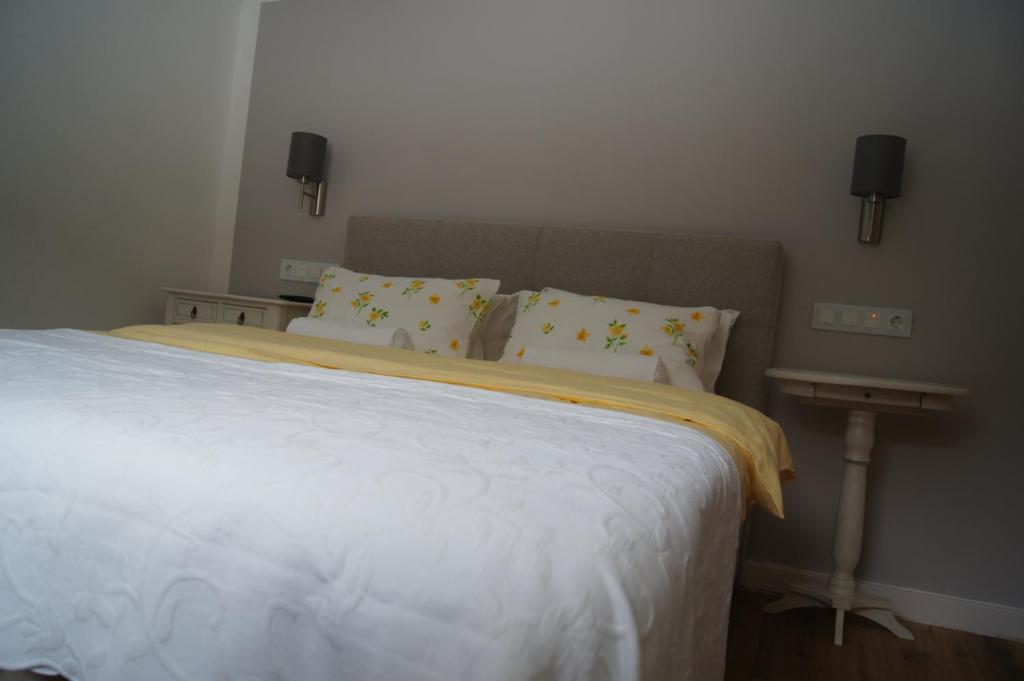 Postel nebo postele na pokoji v ubytování Land - Haus