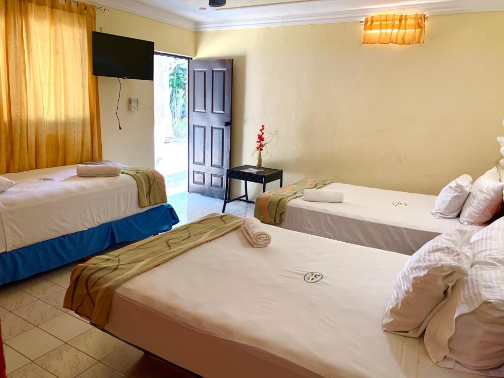 Postel nebo postele na pokoji v ubytování Hotel Green River