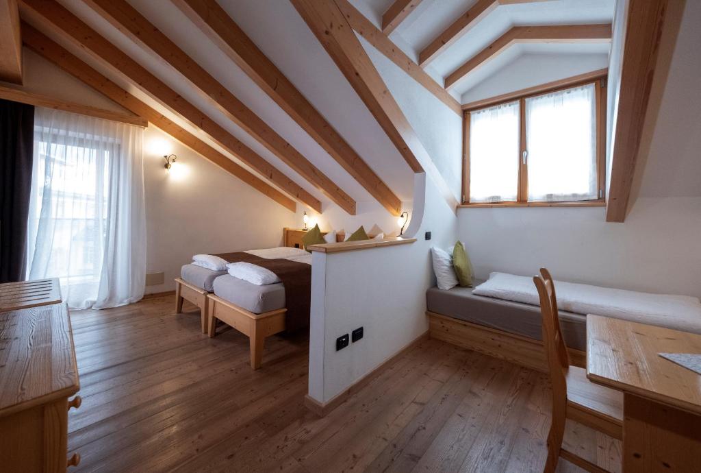 Postel nebo postele na pokoji v ubytování Active Hotel Rosat