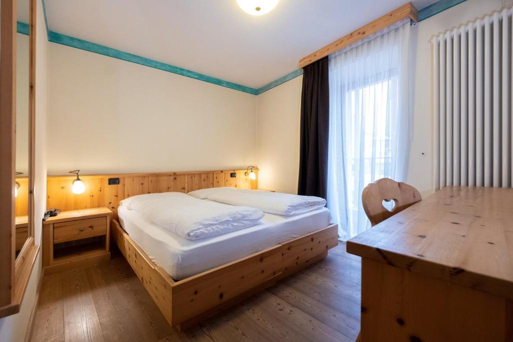 Postel nebo postele na pokoji v ubytování Active Hotel Rosat