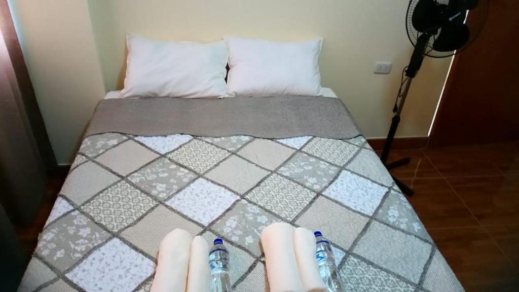 Postel nebo postele na pokoji v ubytování Hospedaje turístico Peruvian Wasi