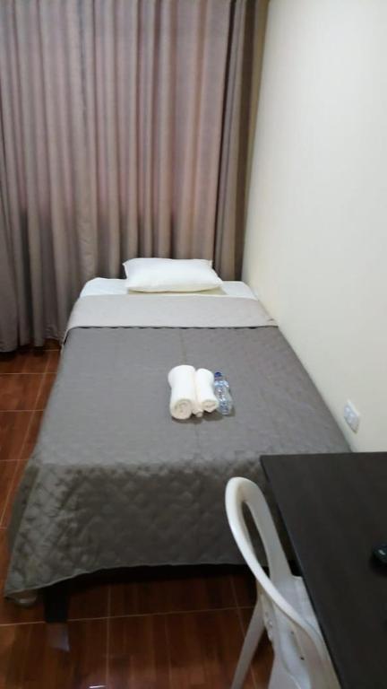Postel nebo postele na pokoji v ubytování Hospedaje turístico Peruvian Wasi