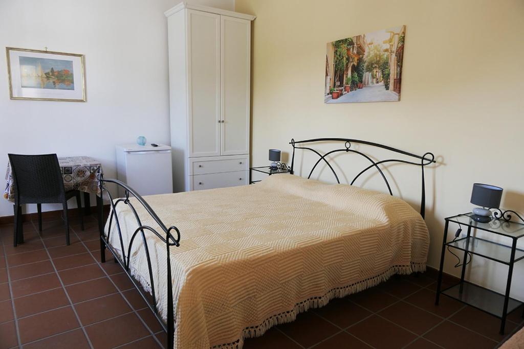 Postel nebo postele na pokoji v ubytování B&B Amèsa