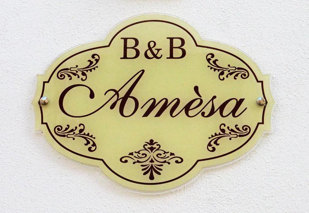 Certifikát, hodnocení, plakát nebo jiný dokument vystavený v ubytování B&B Amèsa