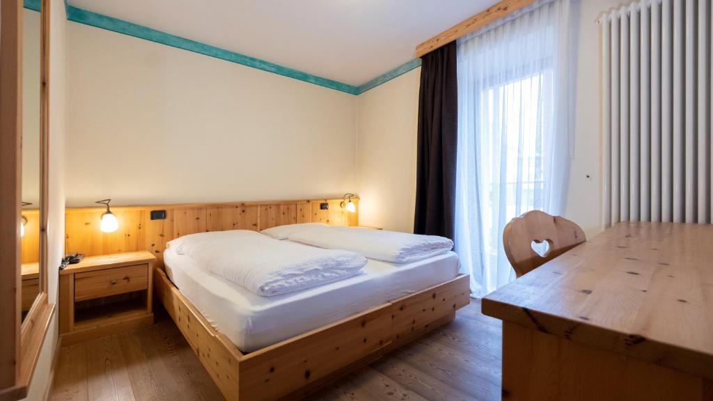 Postel nebo postele na pokoji v ubytování Active Hotel Rosat