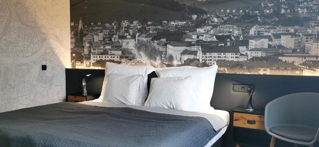 Postel nebo postele na pokoji v ubytování Hotel CityMap Maribor