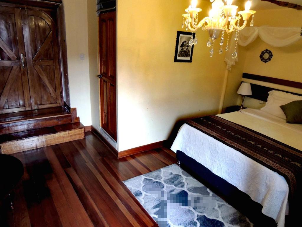 Postel nebo postele na pokoji v ubytování Kori Gems Inn