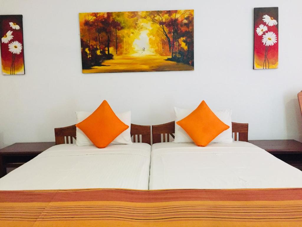 Postel nebo postele na pokoji v ubytování Hotel Sunflower