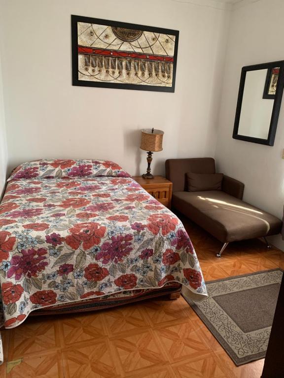 Postel nebo postele na pokoji v ubytování Casa La Minerva