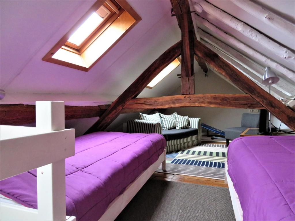 Postel nebo postele na pokoji v ubytování Maison d'Engon charme nature