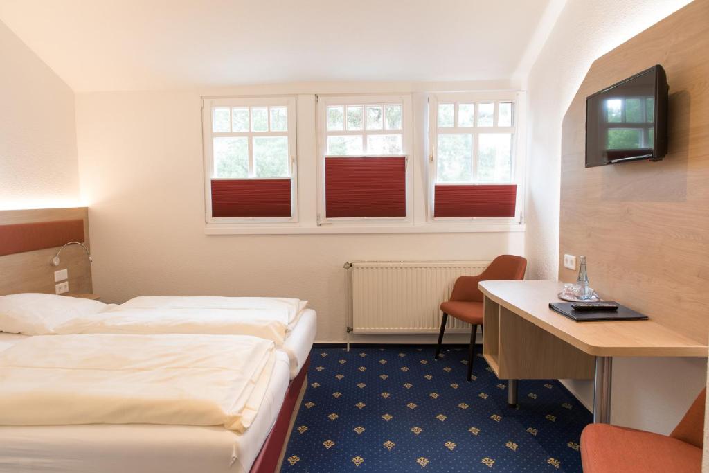 TV a/nebo společenská místnost v ubytování Hotel Restaurant Lathener Marsch