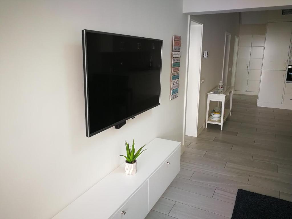Telewizja i/lub zestaw kina domowego w obiekcie Cozy Luxury