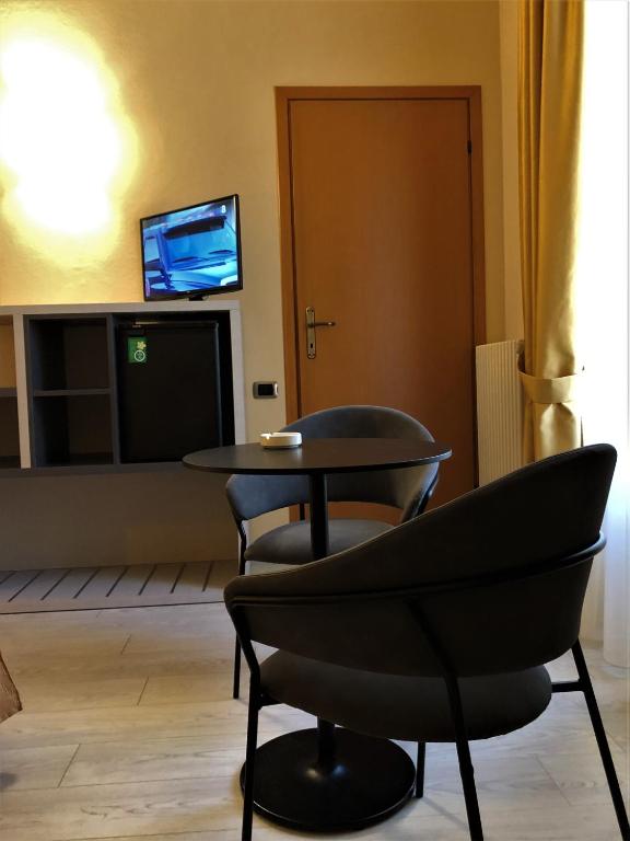 TV a/nebo společenská místnost v ubytování Hotel Tirrenia