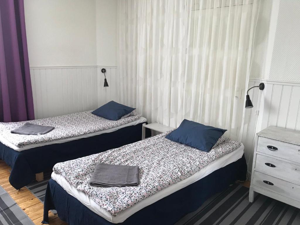Postel nebo postele na pokoji v ubytování Gävle Bed & Breakfast