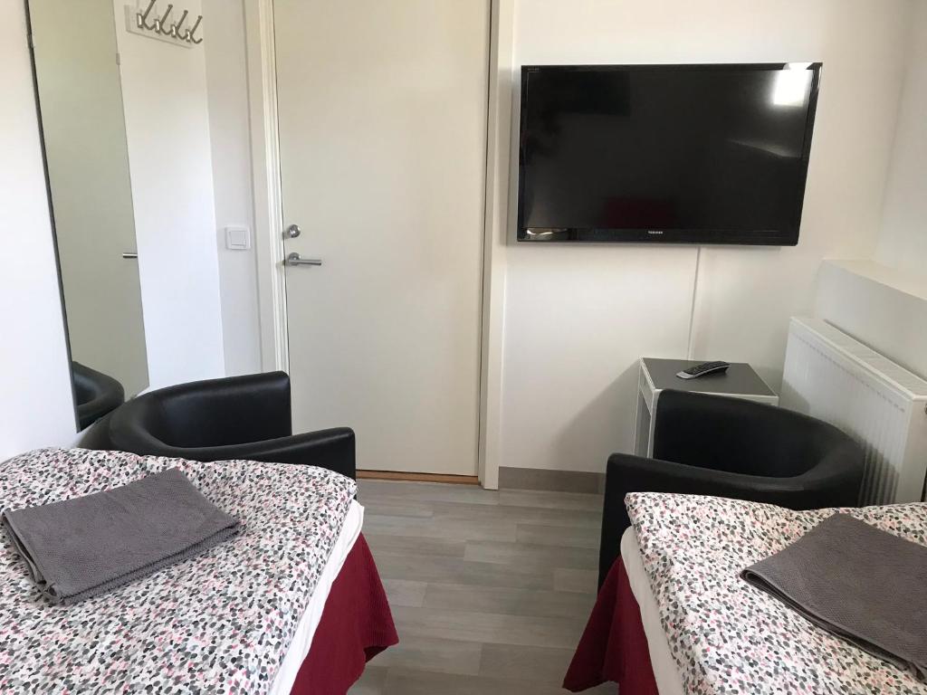TV a/nebo společenská místnost v ubytování Gävle Bed & Breakfast