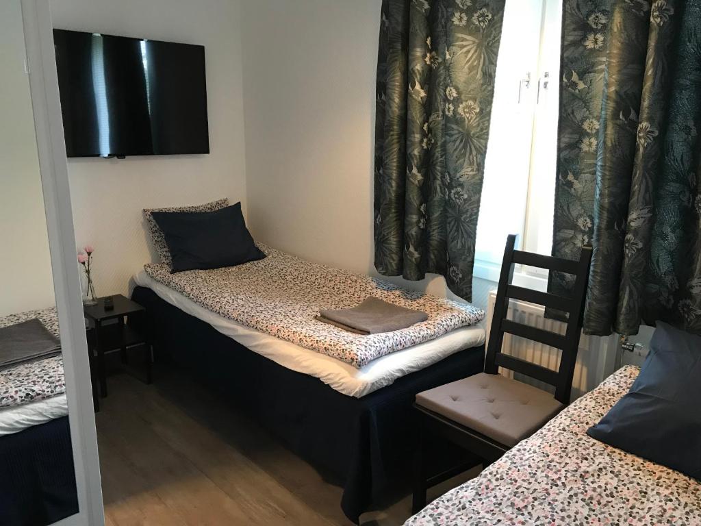 Postel nebo postele na pokoji v ubytování Gävle Bed & Breakfast
