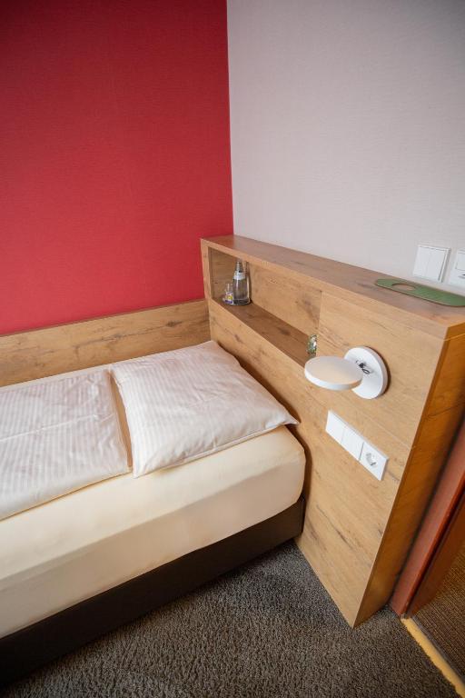 Postel nebo postele na pokoji v ubytování Hotel Azenberg