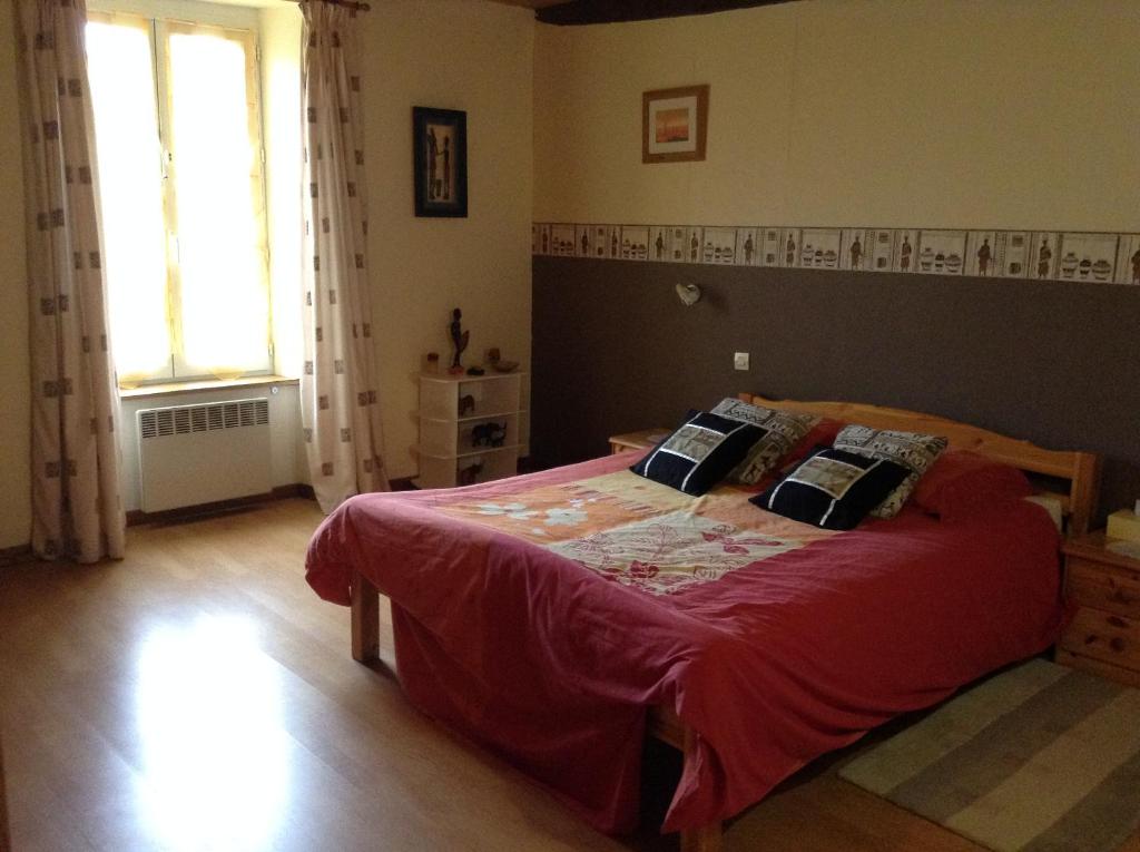 Postel nebo postele na pokoji v ubytování Le Bois Chef D'Ane