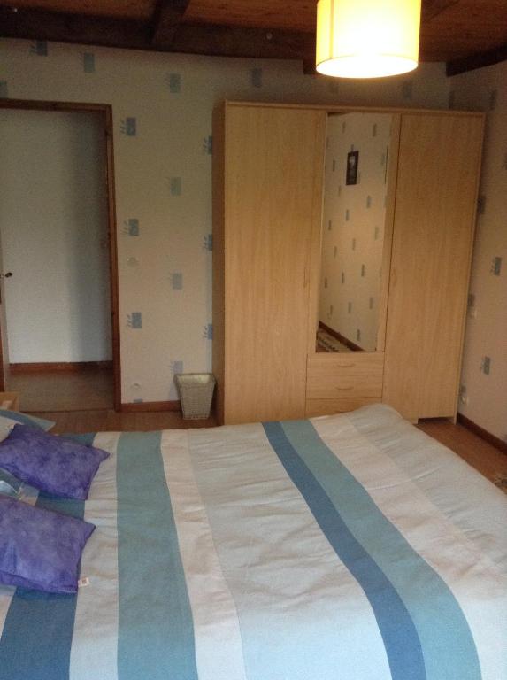 Postel nebo postele na pokoji v ubytování Le Bois Chef D'Ane