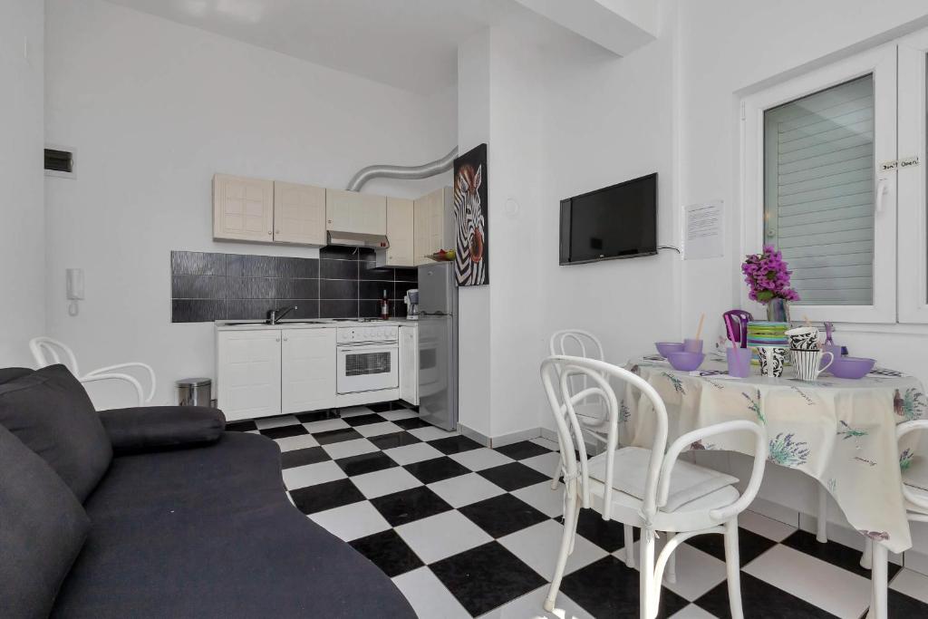 Kuchyň nebo kuchyňský kout v ubytování Apartments Vele