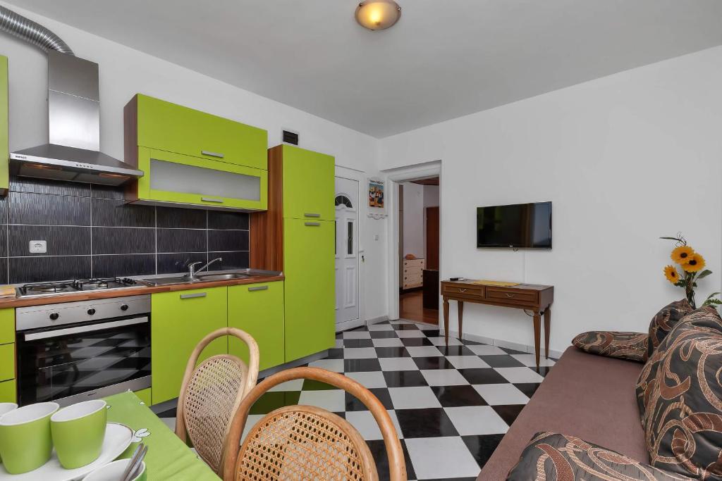 Kuchyň nebo kuchyňský kout v ubytování Apartments Vele