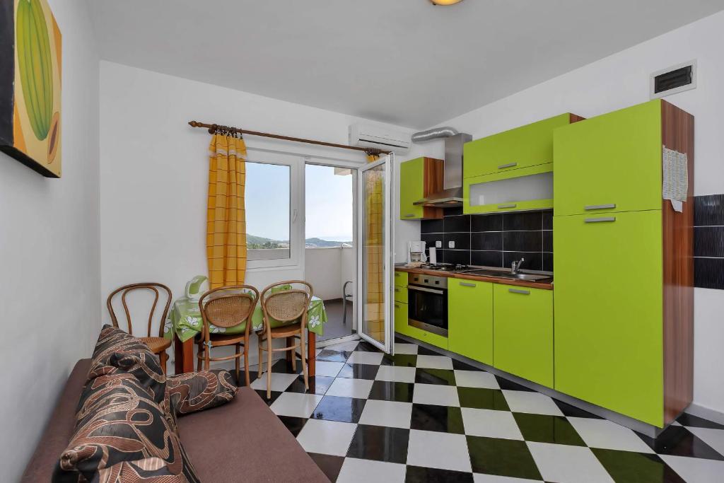 Kuchyň nebo kuchyňský kout v ubytování Apartments Vele