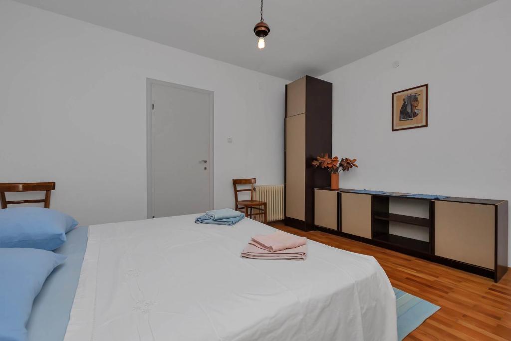 Postel nebo postele na pokoji v ubytování Apartments Vele