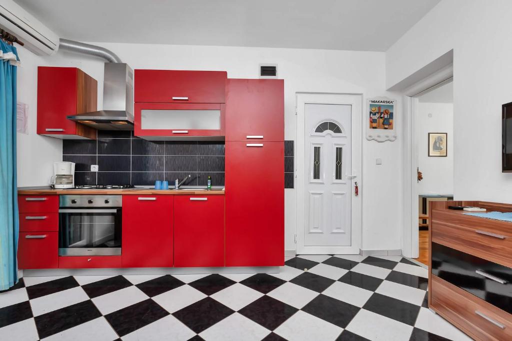 Kuchyň nebo kuchyňský kout v ubytování Apartments Vele