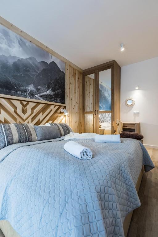 Posteľ alebo postele v izbe v ubytovaní Apartamenty Royal Resort Spa