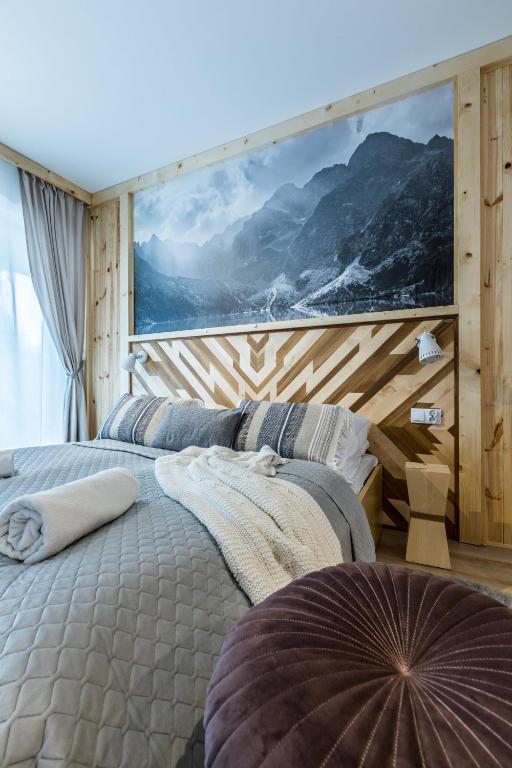 Posteľ alebo postele v izbe v ubytovaní Apartamenty Royal Resort Spa
