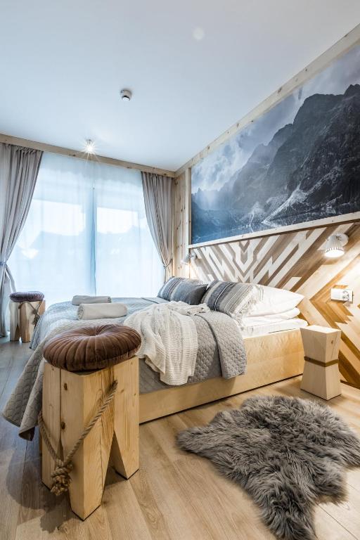 Posteľ alebo postele v izbe v ubytovaní Apartamenty Royal Resort Spa