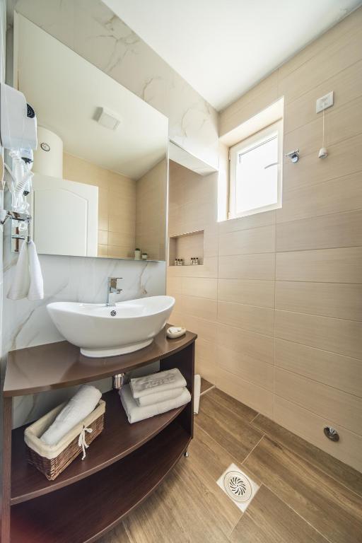 Koupelna v ubytování Garni Hotel President de Luxe