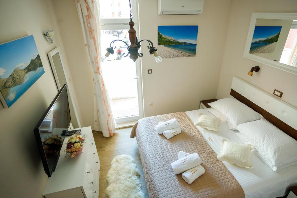 Posteľ alebo postele v izbe v ubytovaní Apartment Centrum