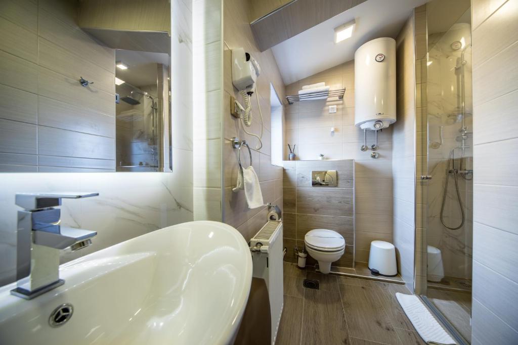 Koupelna v ubytování Garni Hotel President de Luxe