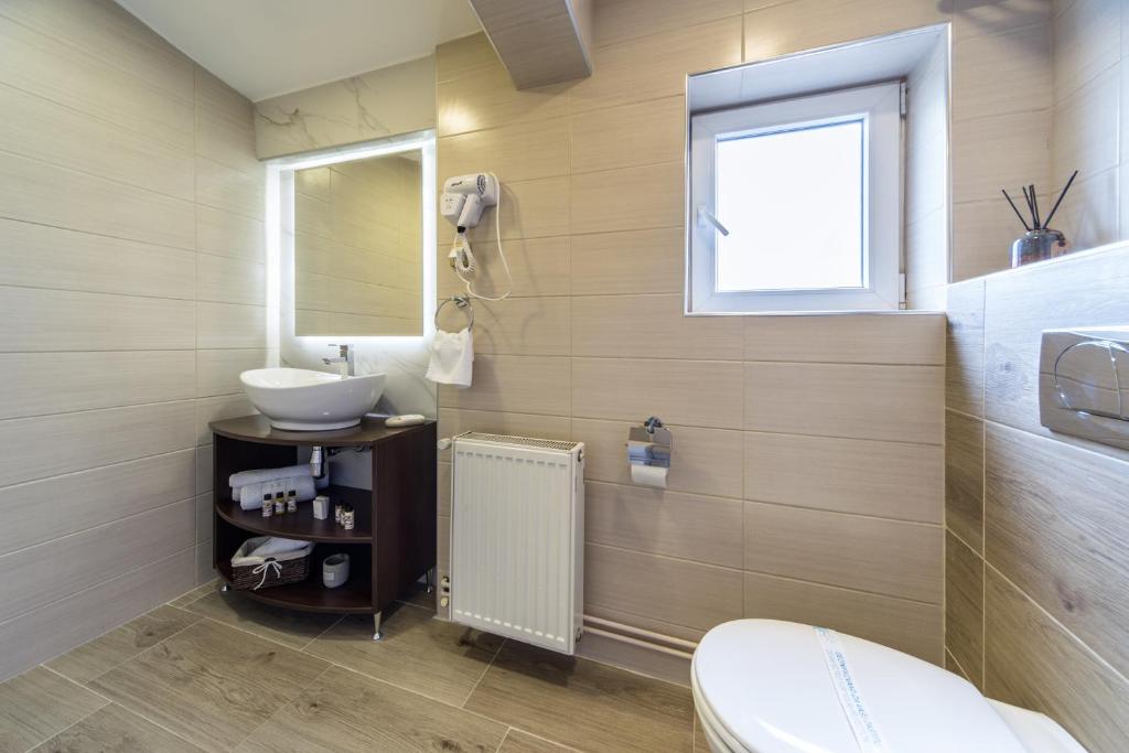 Koupelna v ubytování Garni Hotel President de Luxe