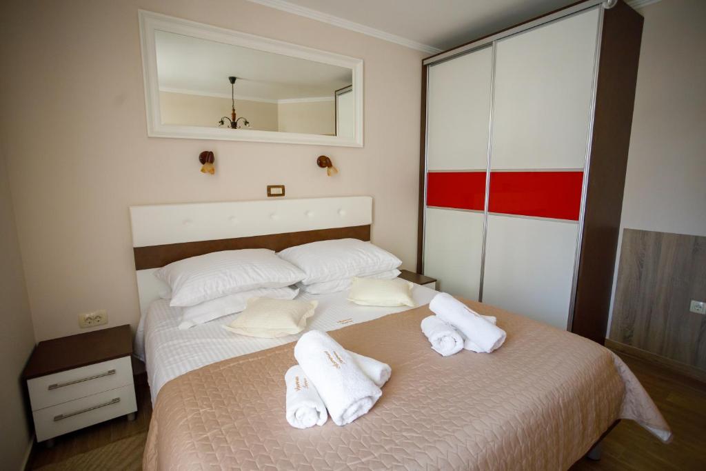 Posteľ alebo postele v izbe v ubytovaní Apartment Centrum