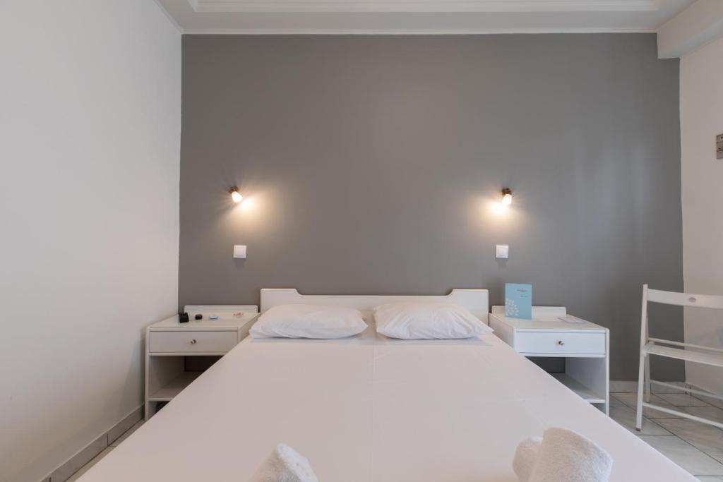 Postel nebo postele na pokoji v ubytování Hotel Melissanthi