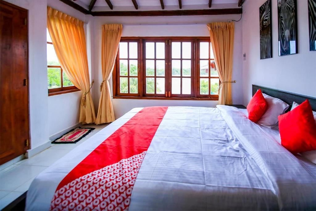 Postel nebo postele na pokoji v ubytování Bay Beach Hotel