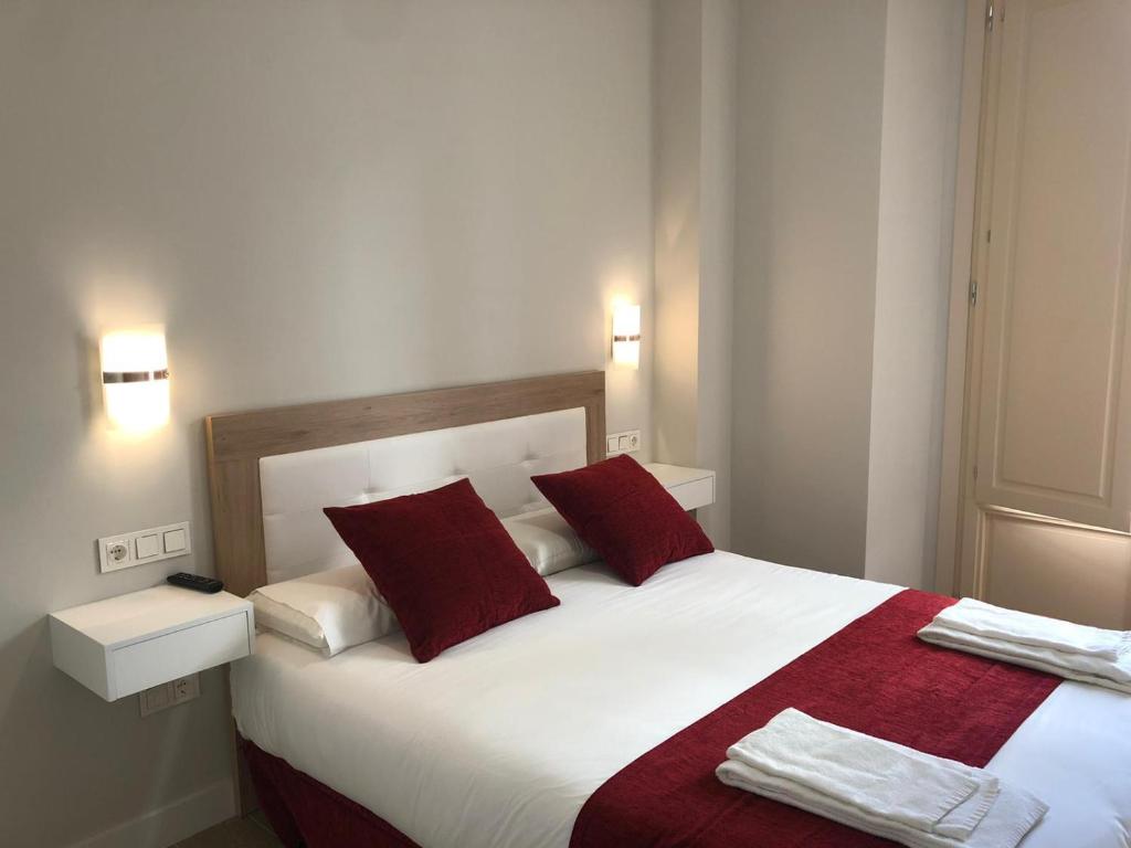 Posteľ alebo postele v izbe v ubytovaní Pinar Malaga Rooms