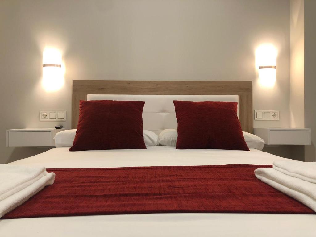 Posteľ alebo postele v izbe v ubytovaní Pinar Malaga Rooms