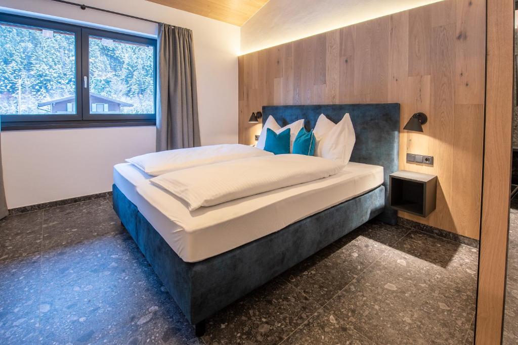 Posteľ alebo postele v izbe v ubytovaní Chalet's DAS DORF