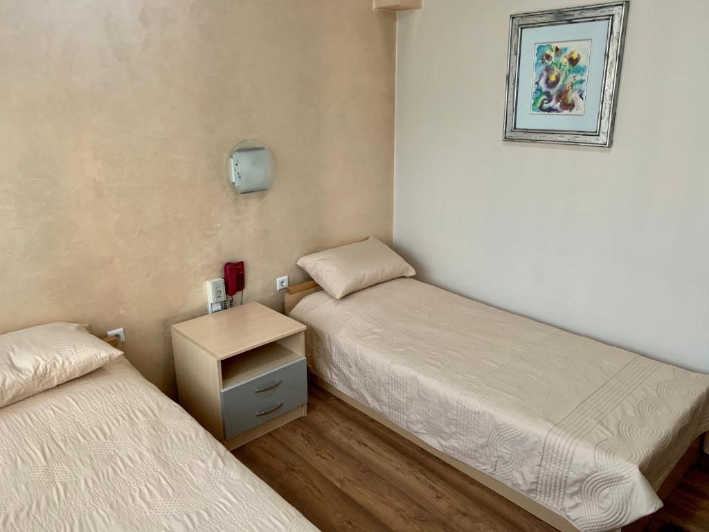 Postel nebo postele na pokoji v ubytování Hotel Brkić Sarajevo Airport - Free Parking