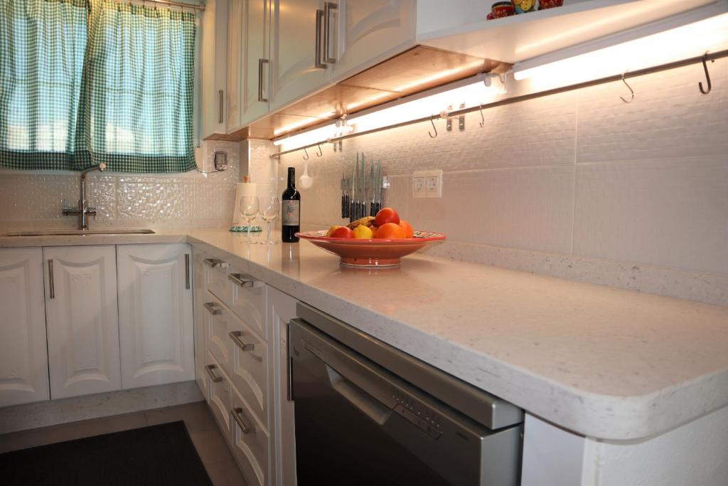 Kuchyňa alebo kuchynka v ubytovaní Coronado 147 Casasol Apartments