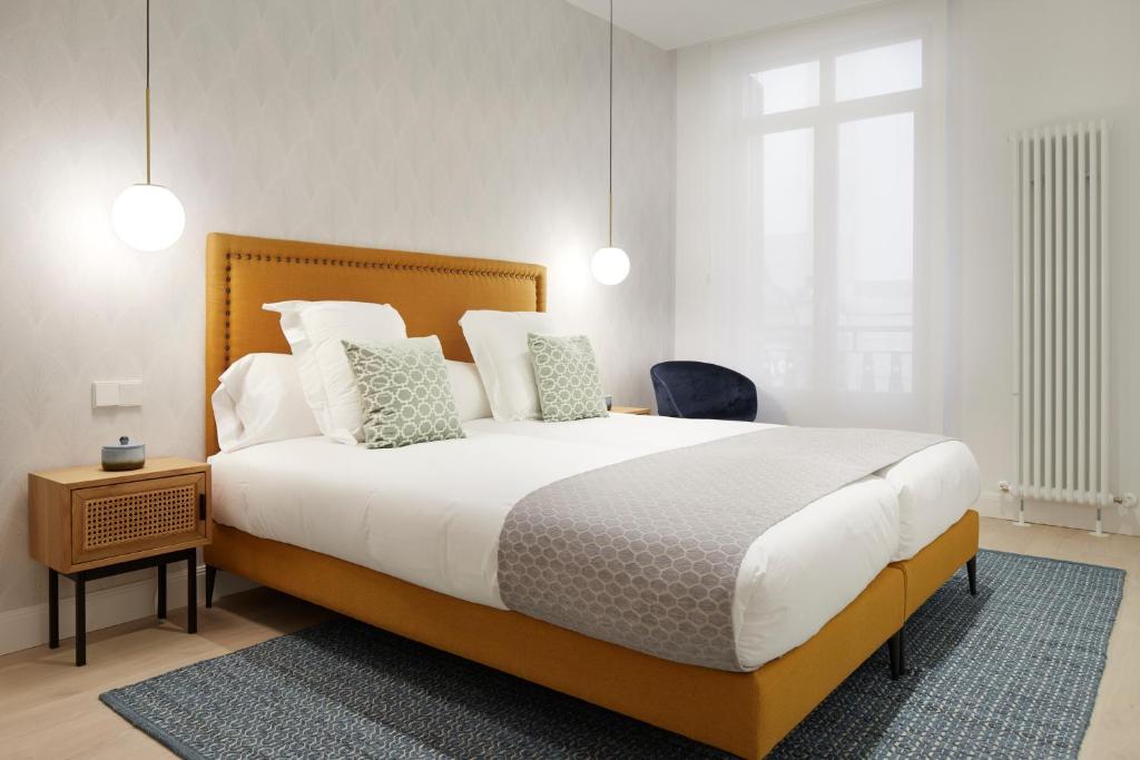 Postel nebo postele na pokoji v ubytování Mayor Suite 8 by FeelFree Rentals