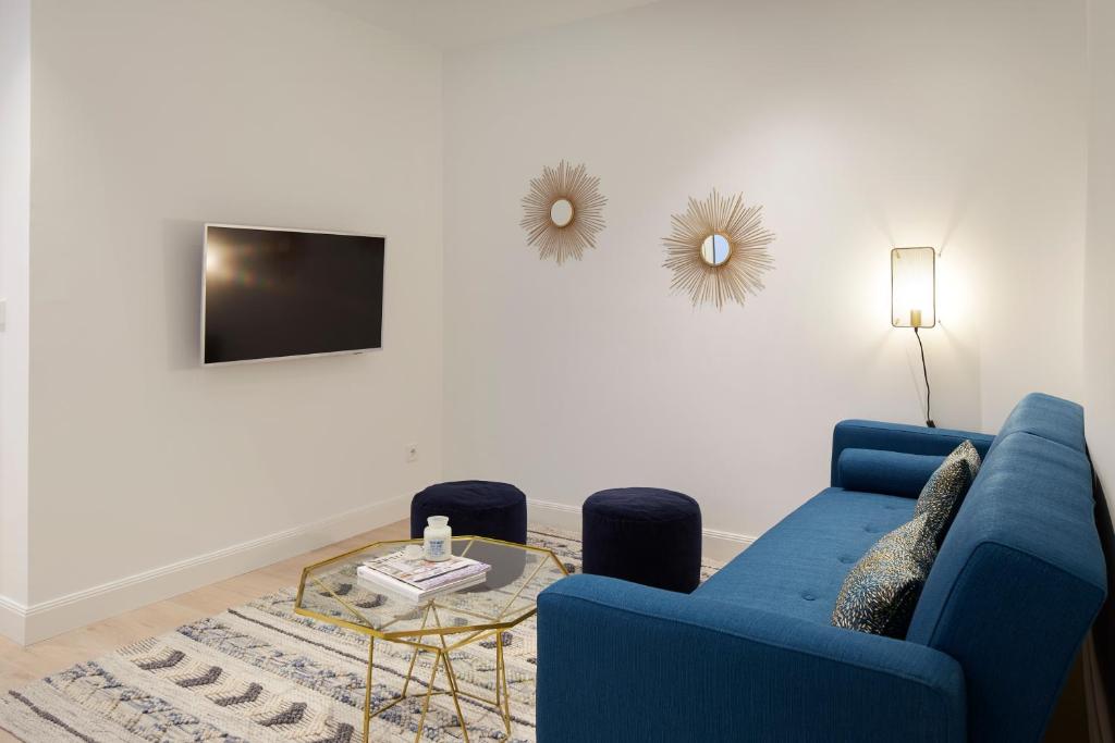 TV a/nebo společenská místnost v ubytování Mayor Suite 8 by FeelFree Rentals