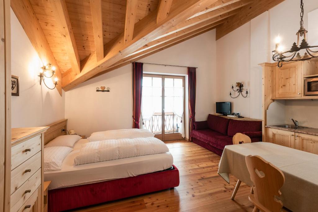 Postel nebo postele na pokoji v ubytování Apartments Sol E Nef