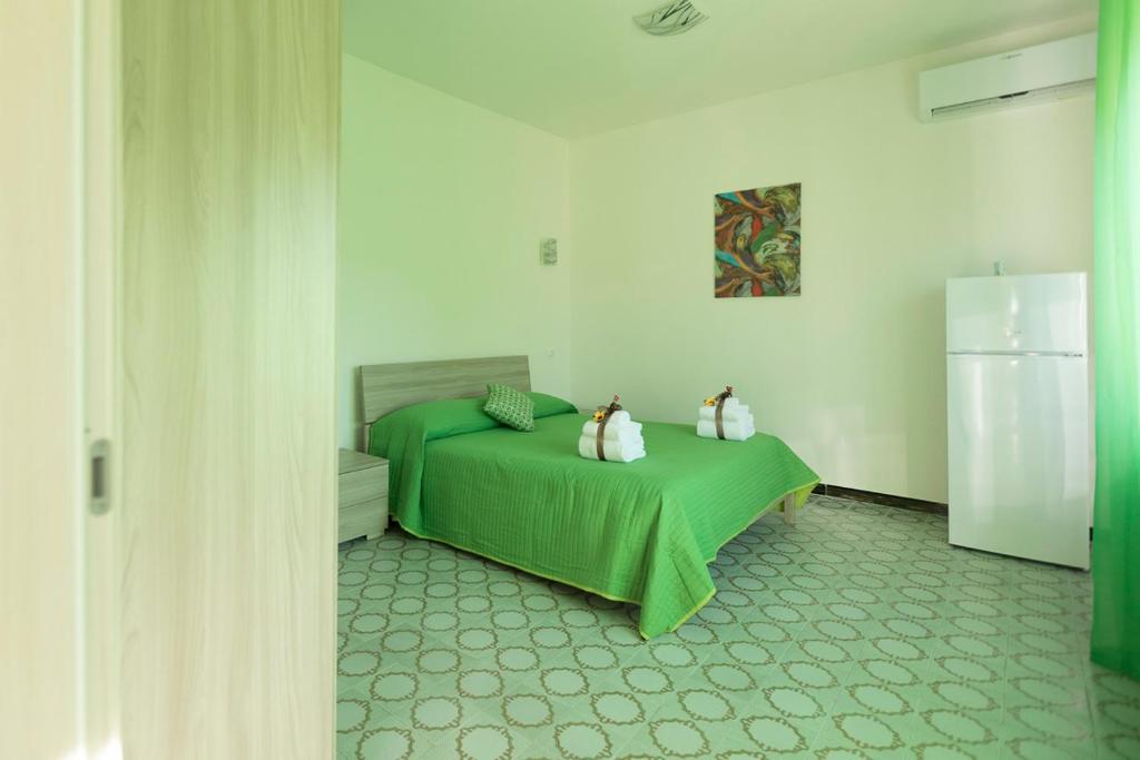 Posteľ alebo postele v izbe v ubytovaní B&B NONNO PEPPE