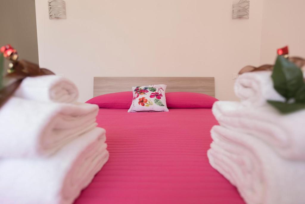 Posteľ alebo postele v izbe v ubytovaní B&B NONNO PEPPE